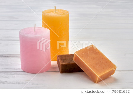 Natural handmade soap bars and candles for spa treatment. 79681632