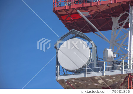Detail of a telecommunication tower with directional mobile phone and internet antennas. Wireless communication equipment transmitter. 5G Technology. 79681896