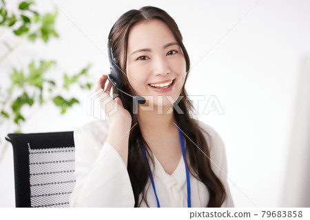 Young operator working in the office 79683858
