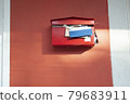 red mailbox with documents overflowing 79683911