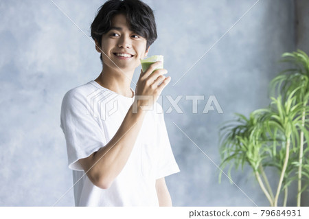 Male drinking smoothies 79684931