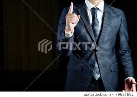 Businessman image on a black background Businessman image on a black background 79685692