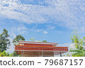 The house roof battens with sky clouds. 79687157