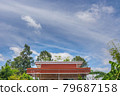 The house roof battens with sky clouds. 79687158