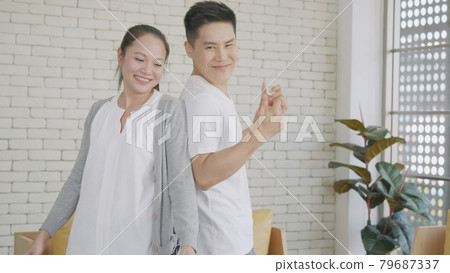 couple husband and wife laughing funny dancing enjoying weekend together 79687337