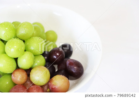 Kyoho Pione Muscat on a white plate Kyoho Pione Muscat on a white plate 79689142