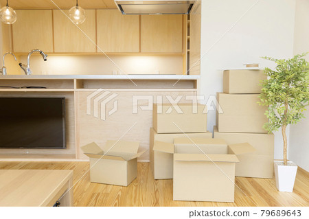 New home, moving image: stacked cardboard boxes New home, moving image: stacked cardboard boxes 79689643