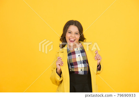 Yellow mood. Fancy child smiling face on yellow background. Yellow mood. Fancy child smiling face on yellow background. 79690933