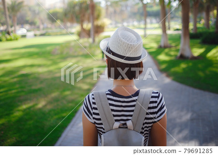 young stylish hipster Asia woman walking on the street young stylish hipster Asia woman walking on the street 79691285