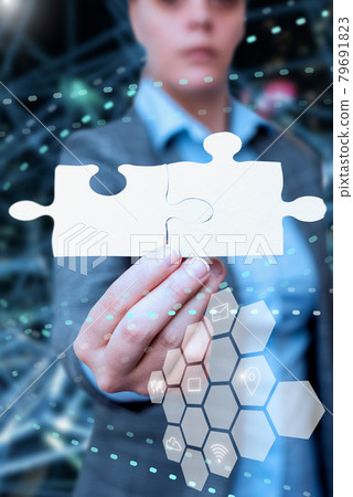 Business Woman Holding Jigsaw Puzzle Piece Unlocking New Futuristic Technologies. Palm Carrying Puzzles Part Displaying Solving Late Innovative Virtual Ideas. Business Woman Holding Jigsaw Puzzle Piece Unlocking New Futuristic Technologies. Palm Carrying Puzzles Part Displaying Solving Late Innovative Virtual Ideas. 79691823