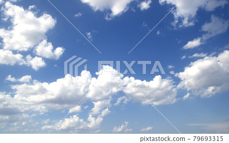 Blue sky background with tiny clouds Blue sky background with tiny clouds 79693315