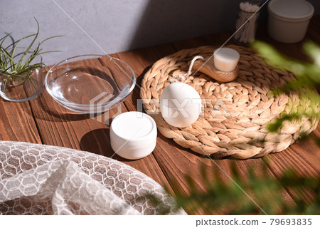 Skin care bottles and bathroom scene Skin care bottles and bathroom scene 79693835