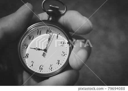 A person with a pocket watch A person with a pocket watch 79694088