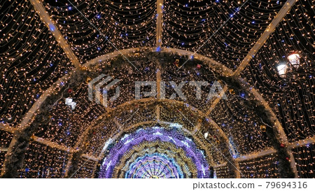 New Year's illumination in Moscow in the form of an arch. New Year's illumination in Moscow in the form of an arch. 79694316