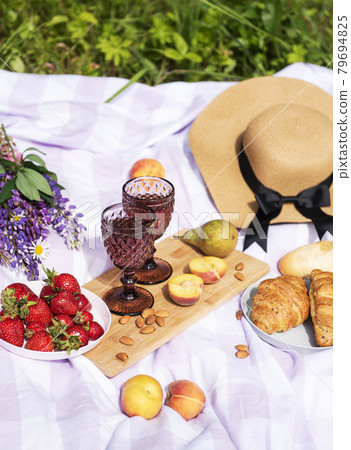 Romantic picnic scene on summer day 79694825