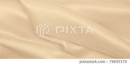 Smooth elegant golden silk or satin luxury cloth texture as wedding background. Luxurious background design. In Sepia toned. Retro style Smooth elegant golden silk or satin luxury cloth texture as wedding background. Luxurious background design. In Sepia toned. Retro style 79695578