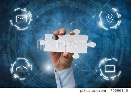 Hand Holding Jigsaw Puzzle Piece Unlocking New Futuristic Technologies. Palm Carrying Puzzles Part Displaying Solving Late Innovative Virtual Ideas. 79696146