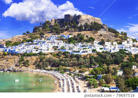 Rhodes island - popular Lindou bay with Acropolis castle. Landmarks of Greece Rhodes island - popular Lindou bay with Acropolis castle. Landmarks of Greece 79697516