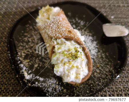 Sicilian cannolo dessert pastry Sicilian cannolo dessert pastry 79697677