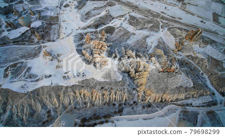 Volcanic rocks of Cappadocia in the winter in Turkey. Aerial view. 79698299