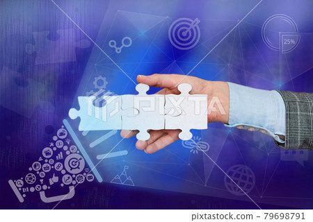 Hand Holding Jigsaw Puzzle Piece Unlocking New Futuristic Technologies. Palm Carrying Puzzles Part Displaying Solving Late Innovative Virtual Ideas. 79698791