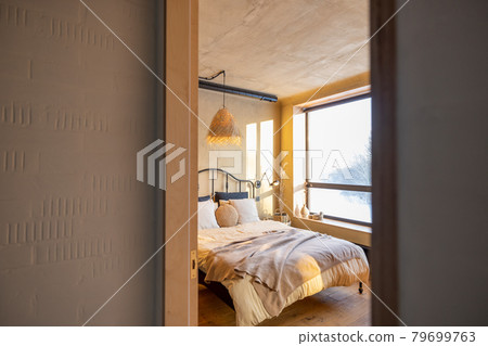 Stylish bedroom interior in natural boho style 79699763