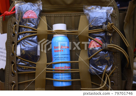 Backpack with soldier s first aid kit: bandages, wound-healing drugs, balloon with burn-treating gel, painkillers Backpack with soldier s first aid kit: bandages, wound-healing drugs, balloon with burn-treating gel, painkillers 79701746