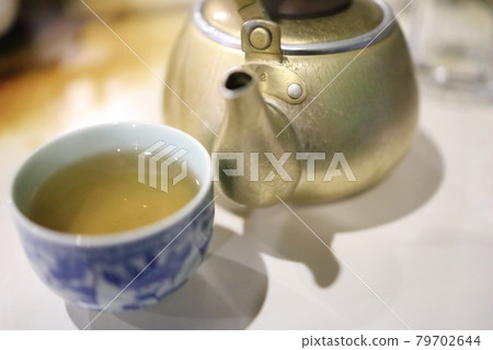 Aluminum kettle and teacups Aluminum kettle and teacups 79702644