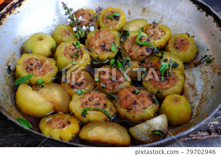 bitter melon stuffed with tofu, mushroom cook with sauce 79702946