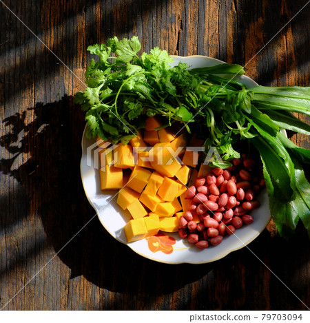 raw material to cook pumpkin soup with peanut and coriander spice, simple dish for Vietnamese vegan meal 79703094