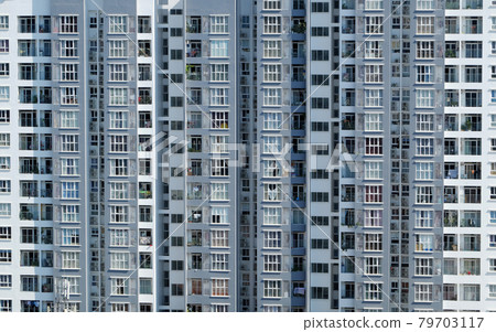 Amazing front of high rise building with many apartment house facade in straght view Amazing front of high rise building with many apartment house facade in straght view 79703117
