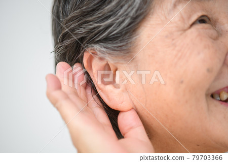 Senior woman ear Senior woman ear 79703366