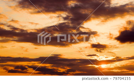 Sunset over the clouds Sunset over the clouds 79704155