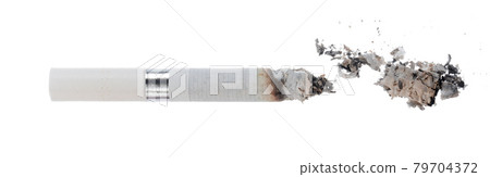 Lit cigarette isolated on white background close up Lit cigarette isolated on white background close up 79704372