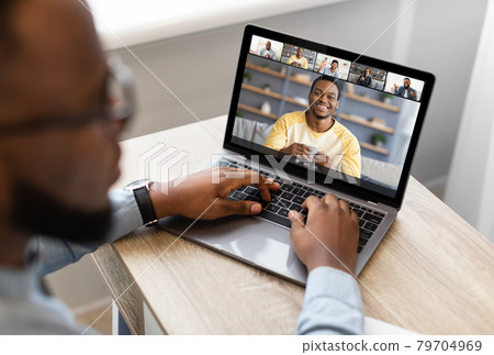 Diverse businessmen making online video call at home 79704969