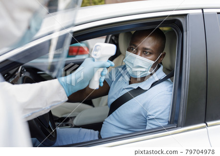 Black man driver wearing protective face mask Black man driver wearing protective face mask 79704978