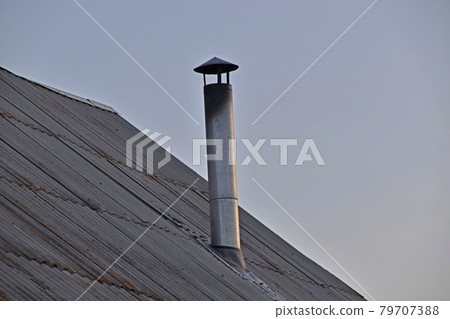 Silver iron chimney pipe of the stove in the house 79707388