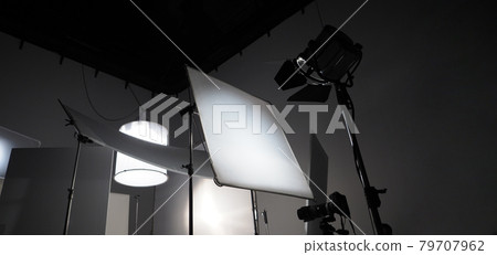 Studio light equipments for photo or film movie video. Light set for professional shooting studio background. LED Flood light and Spot light for video production studio. Setup include Barn door softbo 79707962