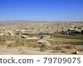 The road in the desert area of Uzbekistan. Buildings 79709075