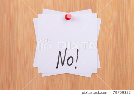 NO! - White Sticky Notes with Written Word NO, Pinned to the Wooden Message Board 79709322