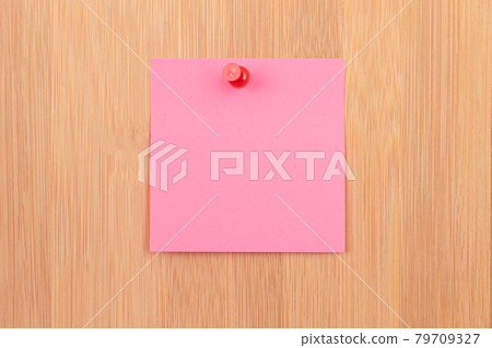 Pink Sticky Note Pinned to the Wooden Message Board Pink Sticky Note Pinned to the Wooden Message Board 79709327