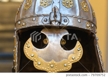 An ancient Knight's helmet with armor.A medieval concept 79709752