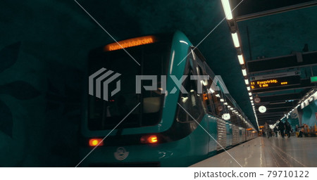 Underground train leaving the station 79710122