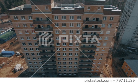 Aerial view of new block of flats built in suburbs, Russia Aerial view of new block of flats built in suburbs, Russia 79711159