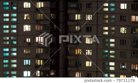 Time lapse shot of buildings and lighted windows at night Time lapse shot of buildings and lighted windows at night 79711179