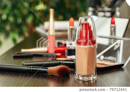 Make up products on vanity table close up 79712841