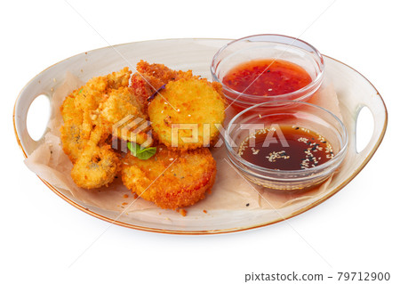 Deep fried chicken nuggets isolated on white background Deep fried chicken nuggets isolated on white background 79712900