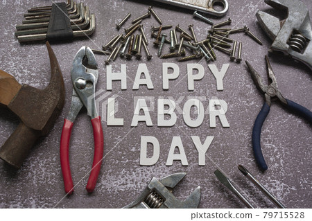Happy labor day text with many handy tools on grunge grey concrete background 79715528