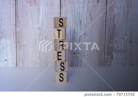 Stress text on wooden block or cubes 79715556