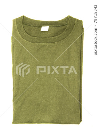 Green folded t-shirt isolated on white background Green folded t-shirt isolated on white background 79718342